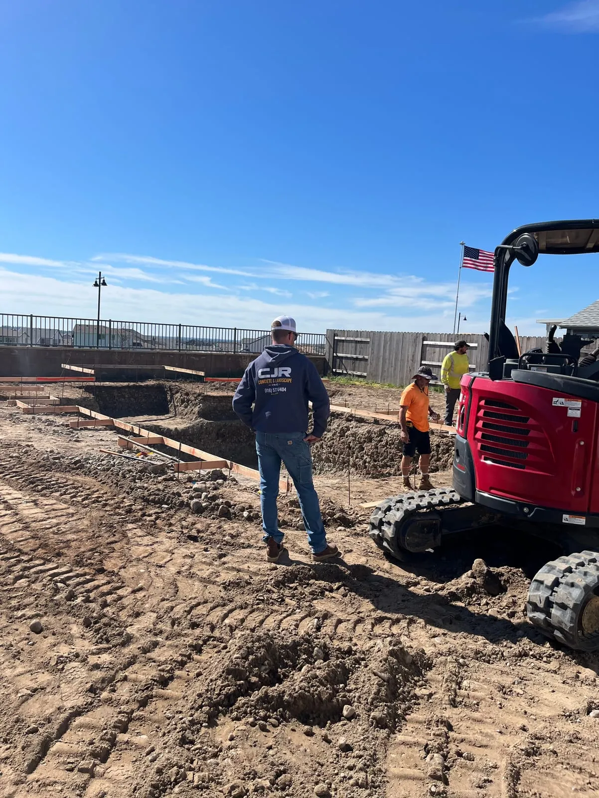 Colton Ray overseeing a CJR pool excavation in 2026