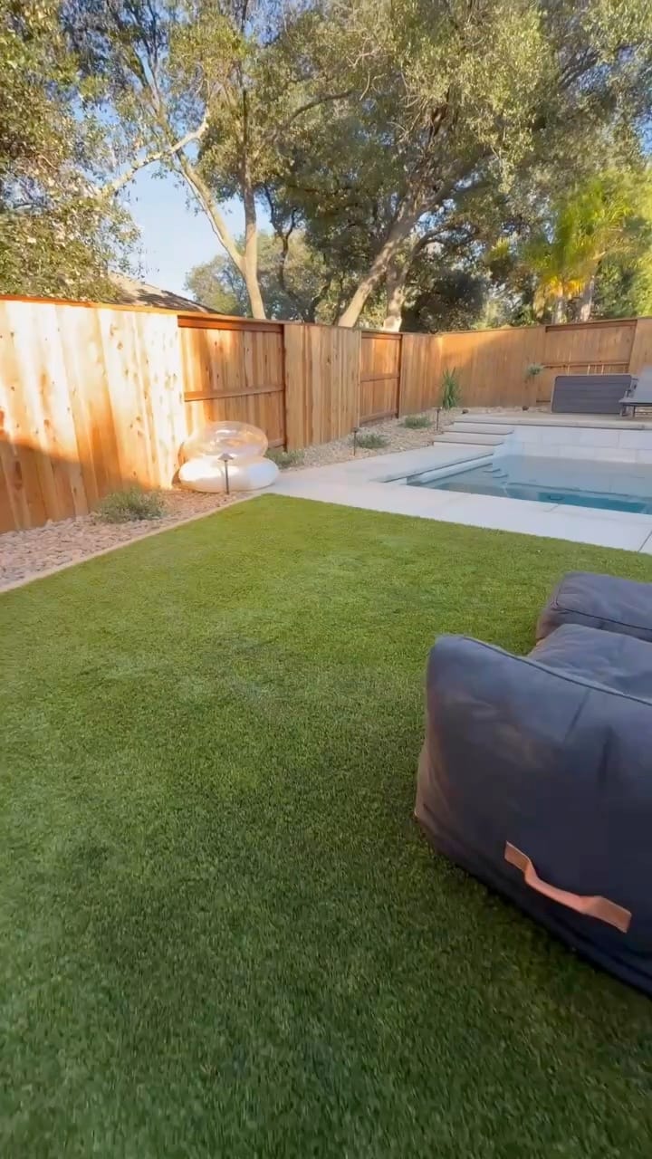 Custom landscape construction with artificial turf by CJR