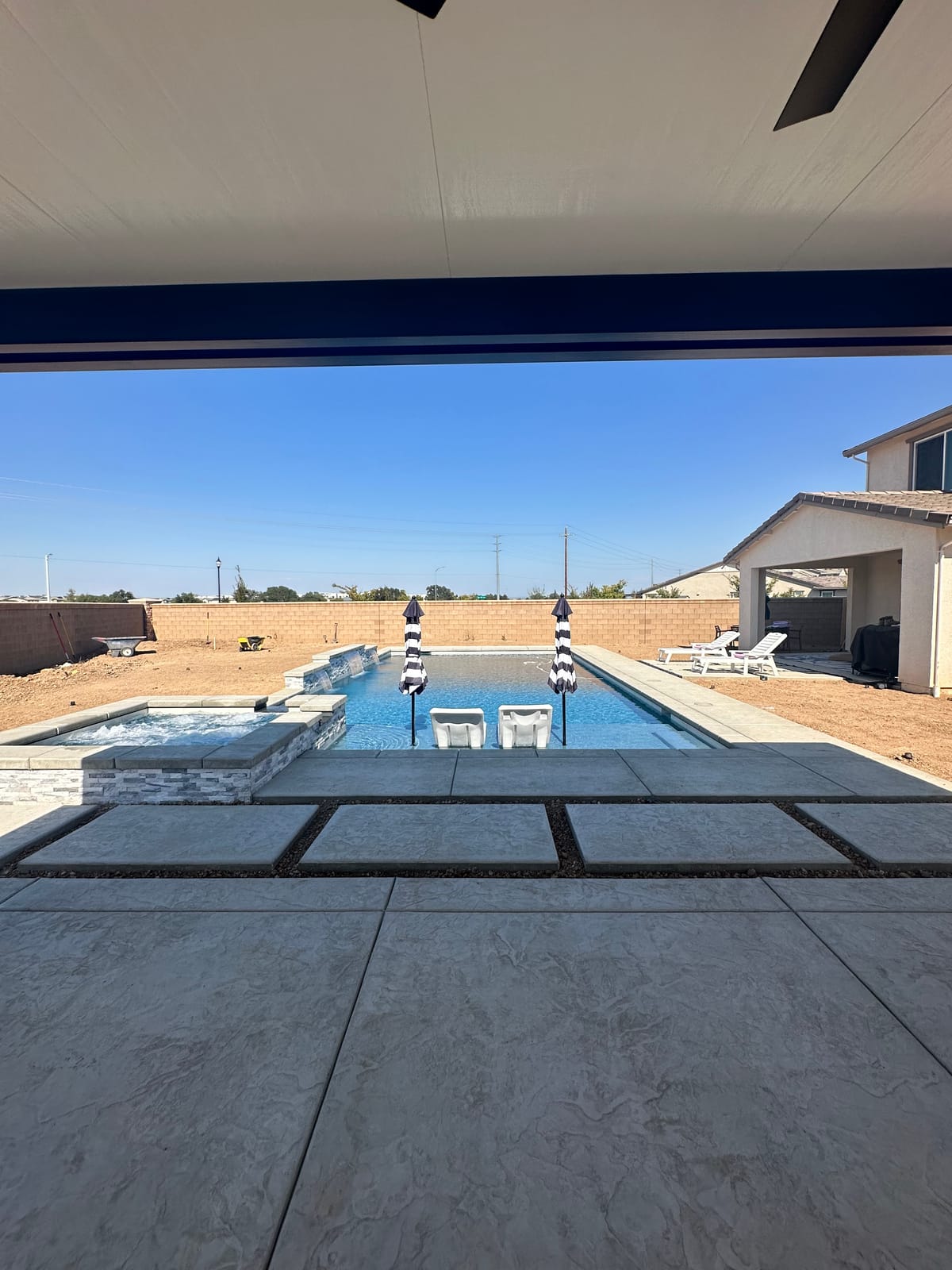 Freeform pool with natural rock detail built by CJR