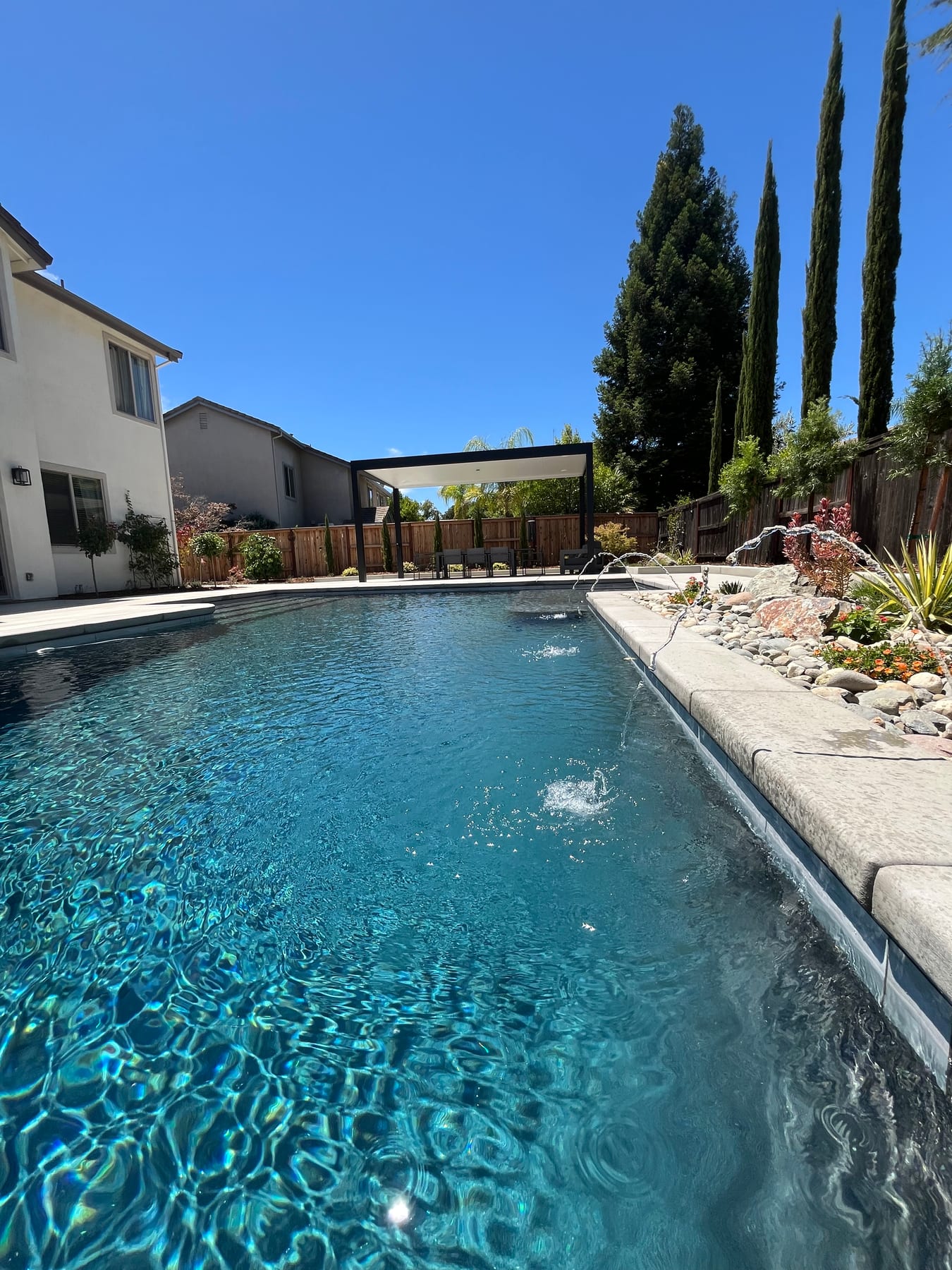 An inviting custom backyard pool built by CJR in the greater Sacramento area