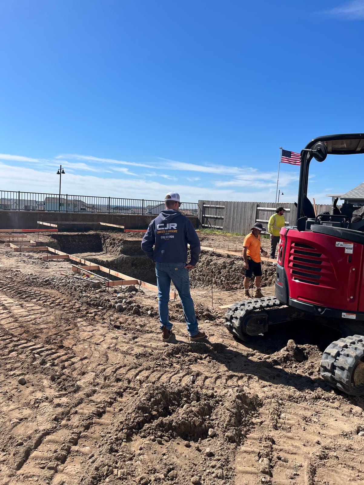 CJR crew on-site during pool excavation with owner-led supervision